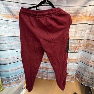 Boys  Burgundy sweatpants.